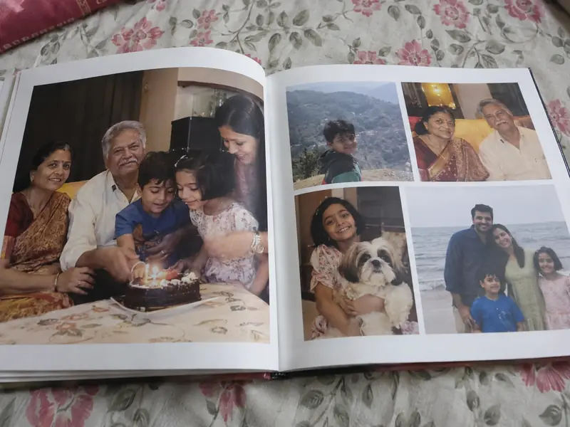 This year's family photos, printed for their album